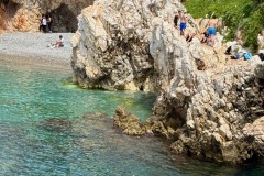 squam-creative-teele-swimming-on-the-rocks-nice