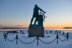 Man at the Wheel in Snow 1